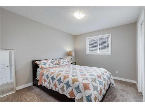 1338 Kings Heights Way Se, Airdrie, AB - Indoor Photo Showing Bedroom