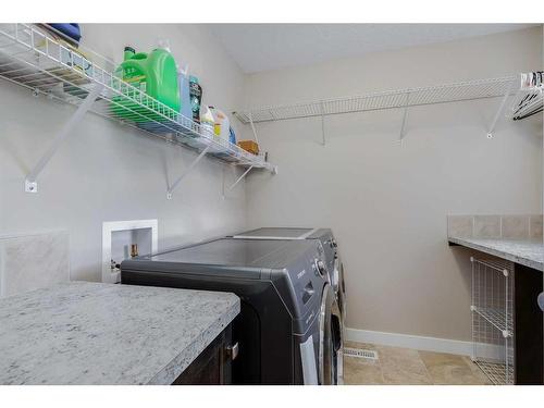 1338 Kings Heights Way Se, Airdrie, AB - Indoor Photo Showing Laundry Room