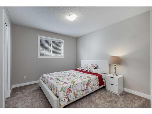 1338 Kings Heights Way Se, Airdrie, AB - Indoor Photo Showing Bedroom