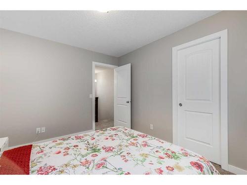 1338 Kings Heights Way Se, Airdrie, AB - Indoor Photo Showing Bedroom