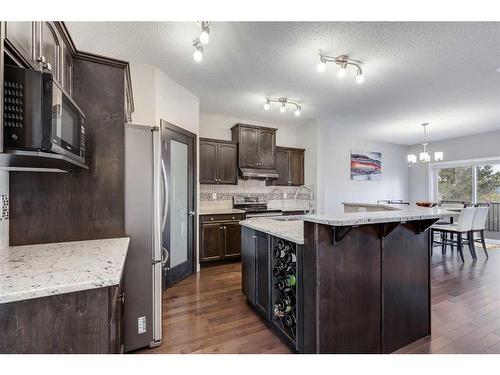 1338 Kings Heights Way Se, Airdrie, AB - Indoor Photo Showing Kitchen With Upgraded Kitchen