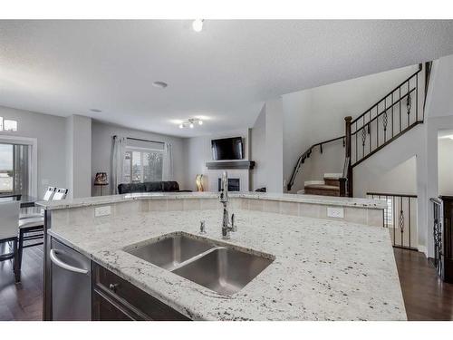 1338 Kings Heights Way Se, Airdrie, AB - Indoor Photo Showing Kitchen With Double Sink