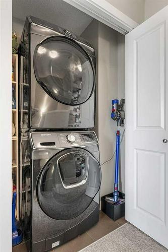 53-300 Marina Drive, Chestermere, AB - Indoor Photo Showing Laundry Room