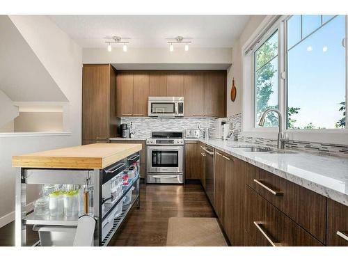 53-300 Marina Drive, Chestermere, AB - Indoor Photo Showing Kitchen With Stainless Steel Kitchen With Upgraded Kitchen