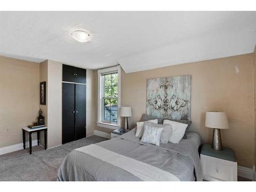 9 Elma Street East, Okotoks, AB - Indoor Photo Showing Bedroom