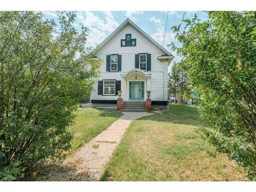 9 Elma Street East, Okotoks, AB - Outdoor With Facade