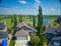 214 Lakeside Greens Place, Chestermere, AB  - Outdoor With Body Of Water With View 