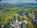 214 Lakeside Greens Place, Chestermere, AB  - Outdoor With Body Of Water With View 