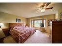 214 Lakeside Greens Place, Chestermere, AB  - Indoor Photo Showing Bedroom 