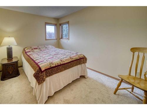 214 Lakeside Greens Place, Chestermere, AB - Indoor Photo Showing Bedroom