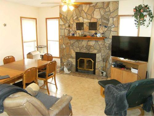 133 6 Avenue Se, Three Hills, AB - Indoor Photo Showing Other Room With Fireplace