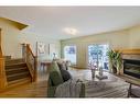 2-1924 32 Street Sw, Calgary, AB  - Indoor Photo Showing Living Room With Fireplace 