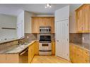 2-1924 32 Street Sw, Calgary, AB  - Indoor Photo Showing Kitchen With Double Sink 