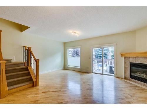 2-1924 32 Street Sw, Calgary, AB - Indoor Photo Showing Living Room With Fireplace