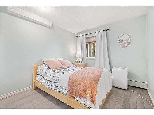 103-709 3 Avenue Nw, Calgary, AB - Indoor Photo Showing Bedroom