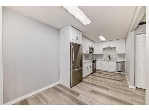 4308 6A Avenue Se, Calgary, AB - Indoor Photo Showing Kitchen With Stainless Steel Kitchen