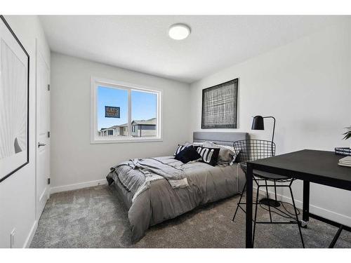 218 Marmot Walk Nw, Calgary, AB - Indoor Photo Showing Bedroom