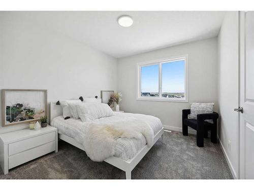 218 Marmot Walk Nw, Calgary, AB - Indoor Photo Showing Bedroom