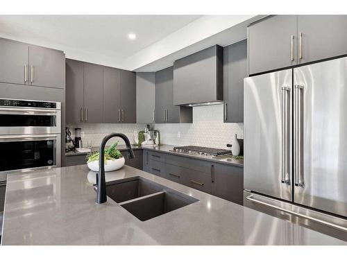 218 Marmot Walk Nw, Calgary, AB - Indoor Photo Showing Kitchen With Double Sink With Upgraded Kitchen