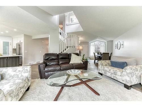 81 Gleneagles Close, Cochrane, AB - Indoor Photo Showing Living Room