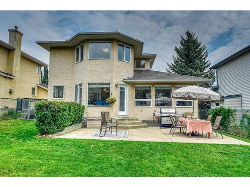 81 Gleneagles Close, Cochrane, AB - Outdoor With Deck Patio Veranda