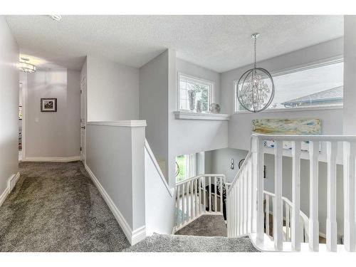 81 Gleneagles Close, Cochrane, AB - Indoor Photo Showing Other Room