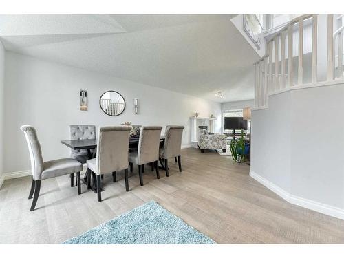 81 Gleneagles Close, Cochrane, AB - Indoor Photo Showing Dining Room