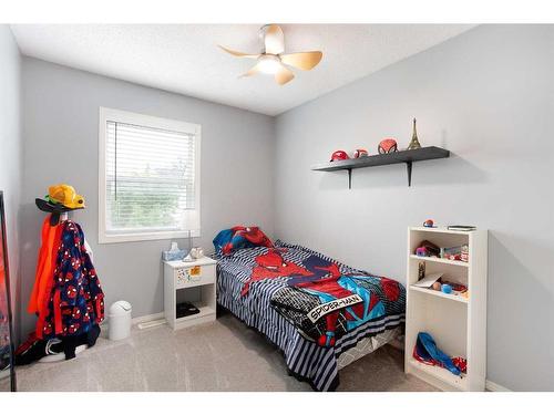 109 Prairie Sound Circle Nw, High River, AB - Indoor Photo Showing Bedroom