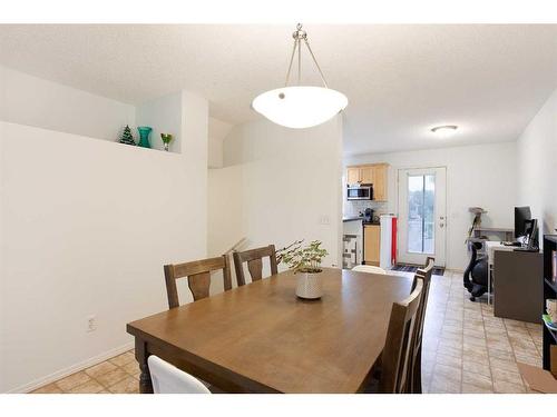 109 Prairie Sound Circle Nw, High River, AB - Indoor Photo Showing Dining Room