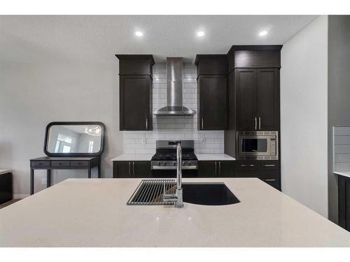 101 Dawson Drive, Chestermere, AB - Indoor Photo Showing Kitchen With Double Sink