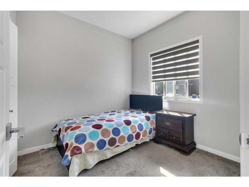 101 Dawson Drive, Chestermere, AB - Indoor Photo Showing Bedroom