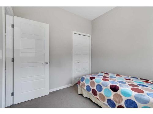 101 Dawson Drive, Chestermere, AB - Indoor Photo Showing Bedroom