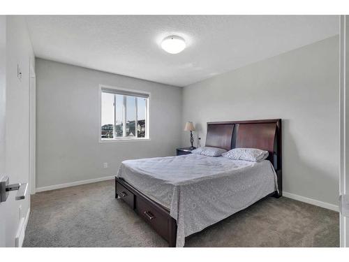 101 Dawson Drive, Chestermere, AB - Indoor Photo Showing Bedroom