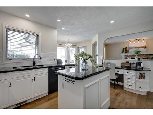 27 Woodford Court Sw, Calgary, AB - Indoor Photo Showing Kitchen With Upgraded Kitchen