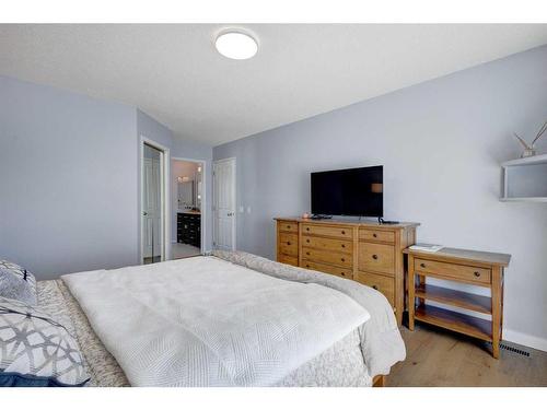 27 Woodford Court Sw, Calgary, AB - Indoor Photo Showing Bedroom