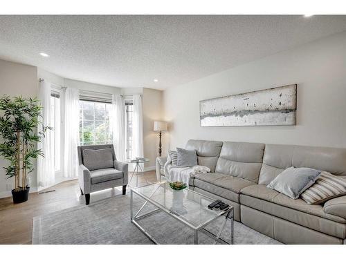 27 Woodford Court Sw, Calgary, AB - Indoor Photo Showing Living Room