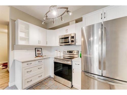 309-1800 14A Street Sw, Calgary, AB - Indoor Photo Showing Kitchen With Stainless Steel Kitchen