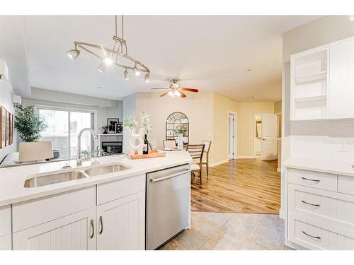 309-1800 14A Street Sw, Calgary, AB - Indoor Photo Showing Kitchen With Double Sink