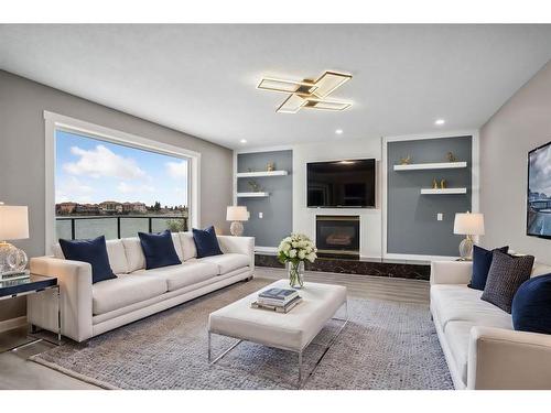 151 Coral Shores Landing Ne, Calgary, AB - Indoor Photo Showing Living Room With Fireplace