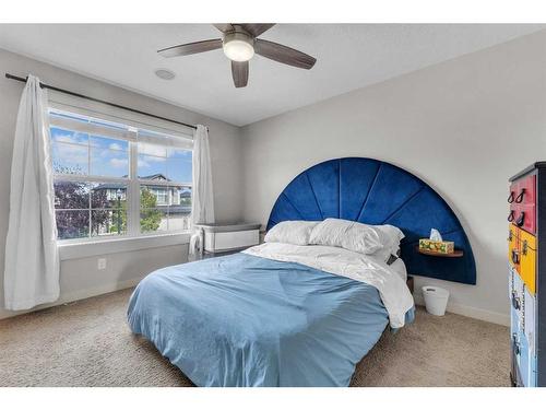 213 Rainbow Falls Manor, Chestermere, AB - Indoor Photo Showing Bedroom