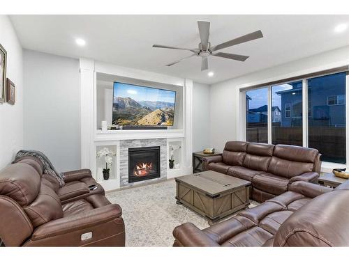 198 Kinniburgh Crescent, Chestermere, AB - Indoor Photo Showing Living Room With Fireplace