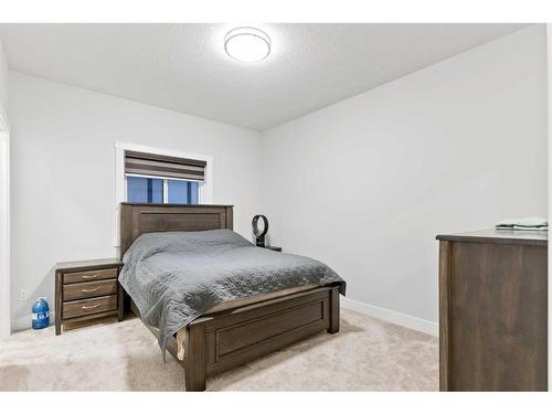 198 Kinniburgh Crescent, Chestermere, AB - Indoor Photo Showing Bedroom