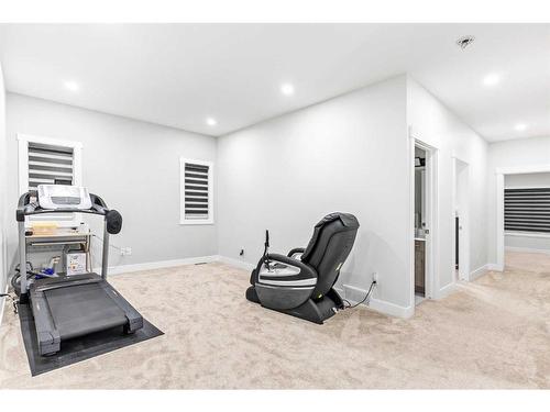 198 Kinniburgh Crescent, Chestermere, AB - Indoor Photo Showing Gym Room