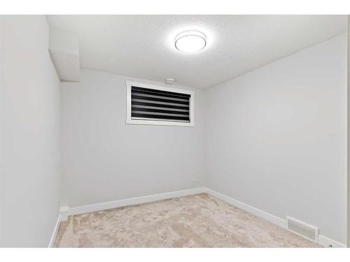 198 Kinniburgh Crescent, Chestermere, AB - Indoor Photo Showing Other Room