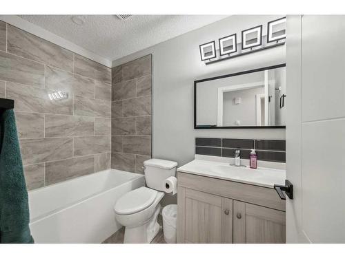 13 Erin Grove Place Se, Calgary, AB - Indoor Photo Showing Bathroom