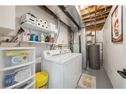 13 Erin Grove Place Se, Calgary, AB - Indoor Photo Showing Laundry Room