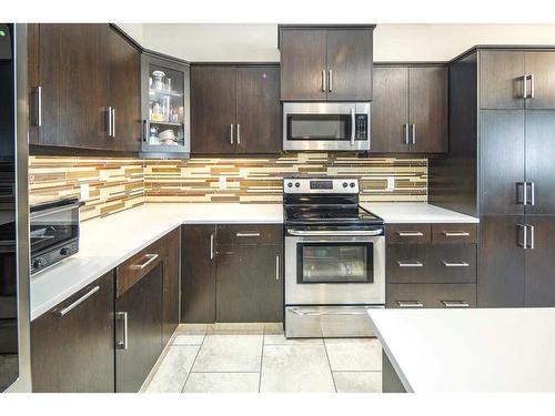 58 Cranberry Mews Se, Calgary, AB - Indoor Photo Showing Kitchen With Stainless Steel Kitchen With Upgraded Kitchen