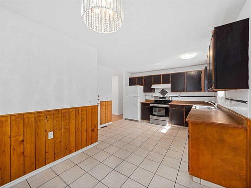 207 Fallswater Road Ne, Calgary, AB - Indoor Photo Showing Kitchen