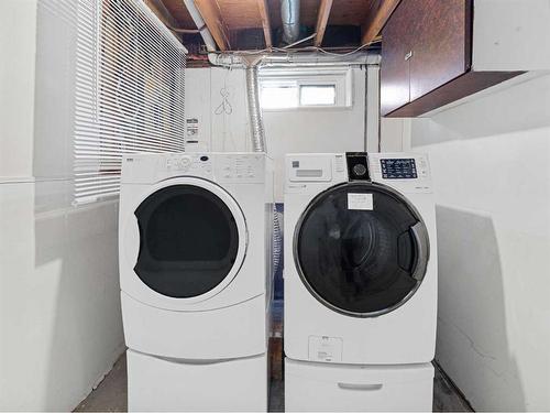 207 Fallswater Road Ne, Calgary, AB - Indoor Photo Showing Laundry Room