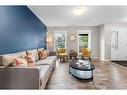 34 Walden Drive Se, Calgary, AB  - Indoor Photo Showing Living Room 